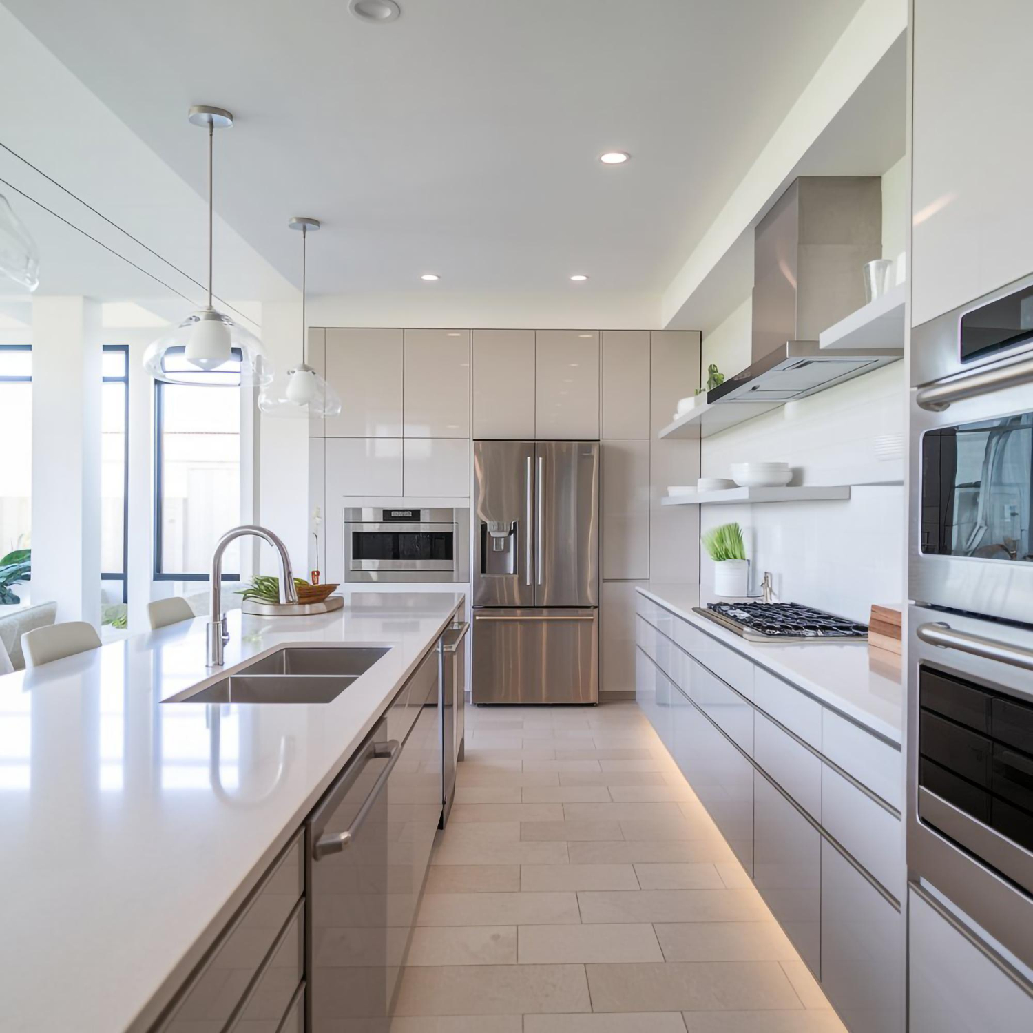 Kitchen remodeling project showing modern cabinets and countertops installation in progress